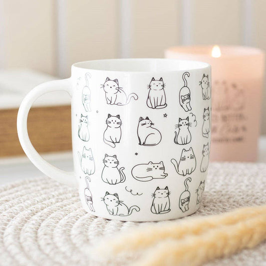 Witte mok met vrolijke kattenprint
